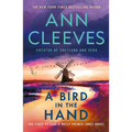 A Bird in the Hand: The First George & Molly Palmer-Jones Novel
